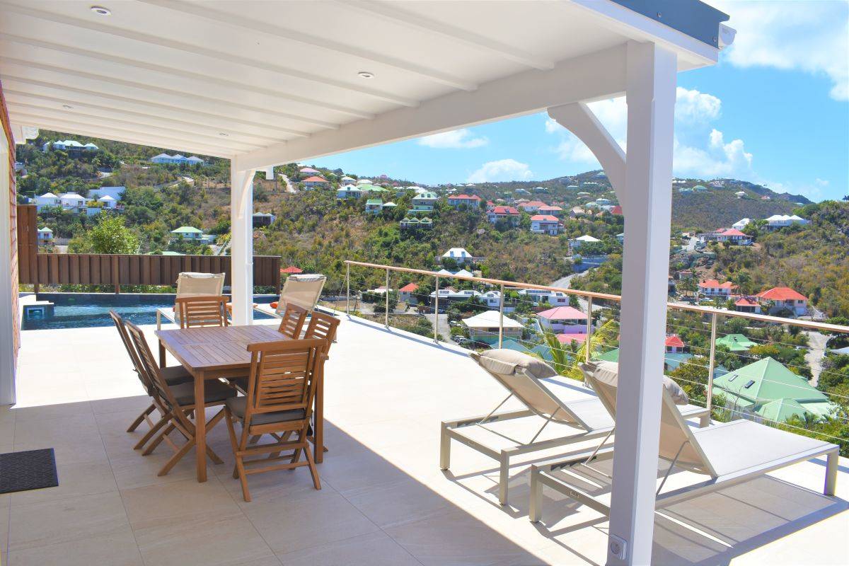 6-ideal-villa-rentals-flamands-cypraea-dining-pool-5d8a7742c3a58504762500.jpg.jpg