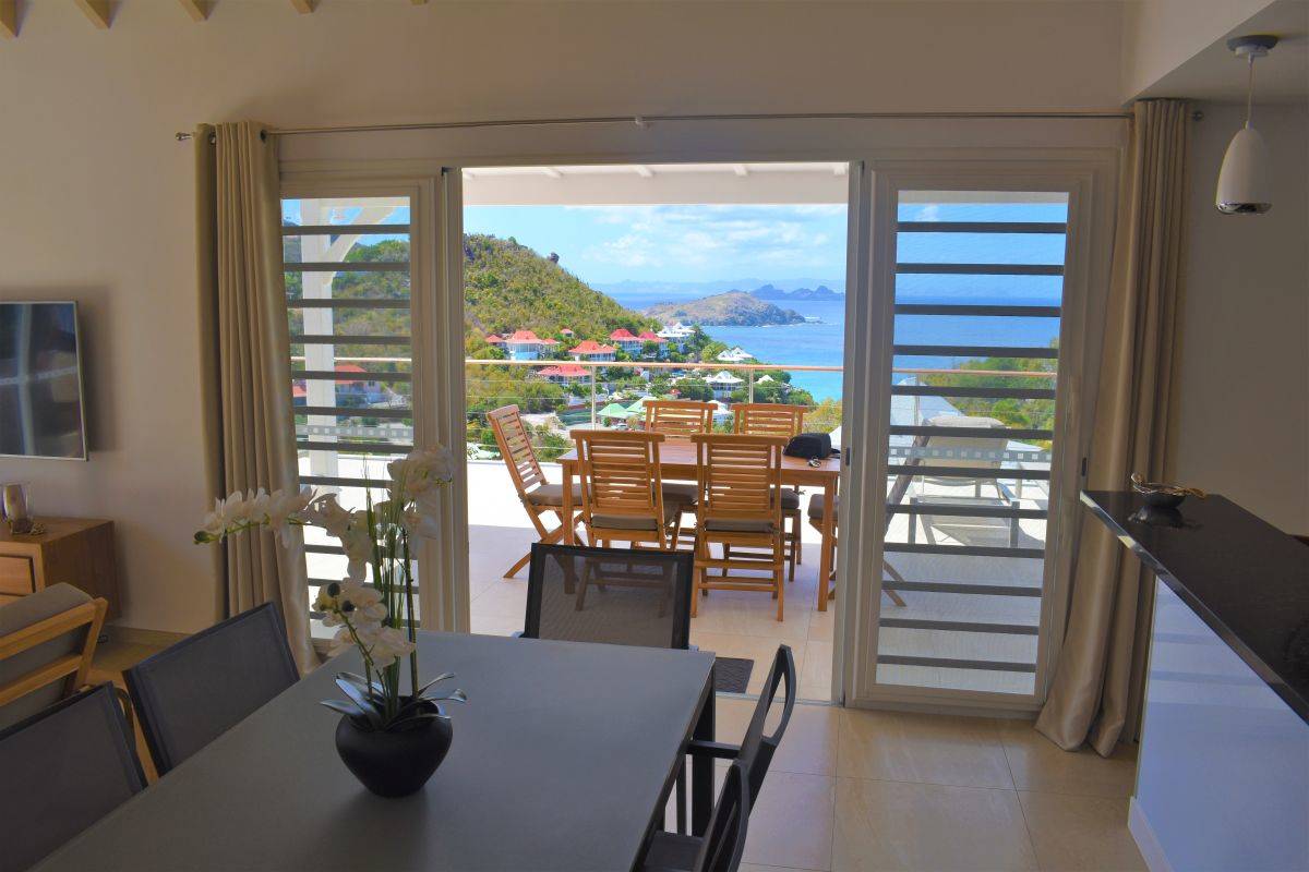 7-ideal-villa-rentals-flamands-cypraea-dining-ocean-view-5d8a77420960f490700964.jpg.jpg